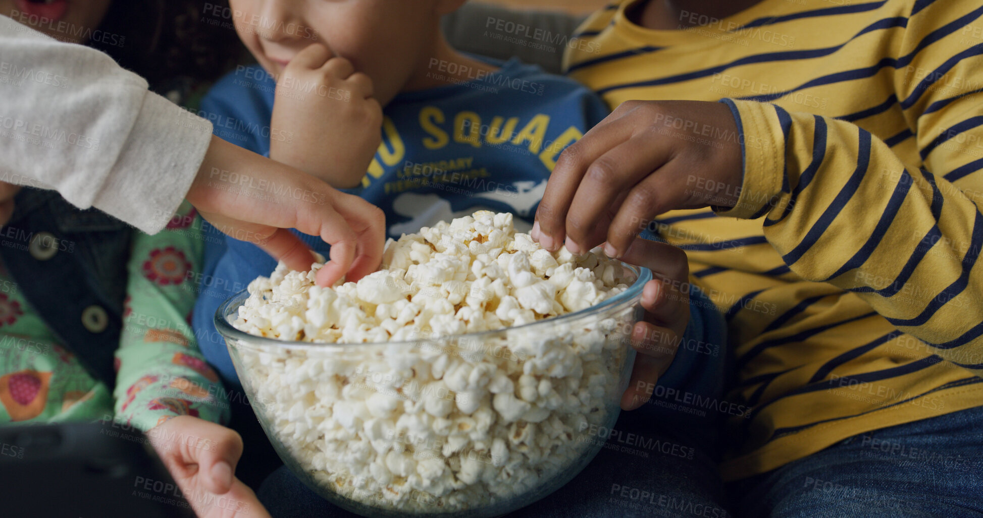 Buy stock photo Popcorn, hands of children and tablet with movie on sofa for entertainment, cartoons or online film. Snack, friends and relax with digital app in home for show, educational series and watching video