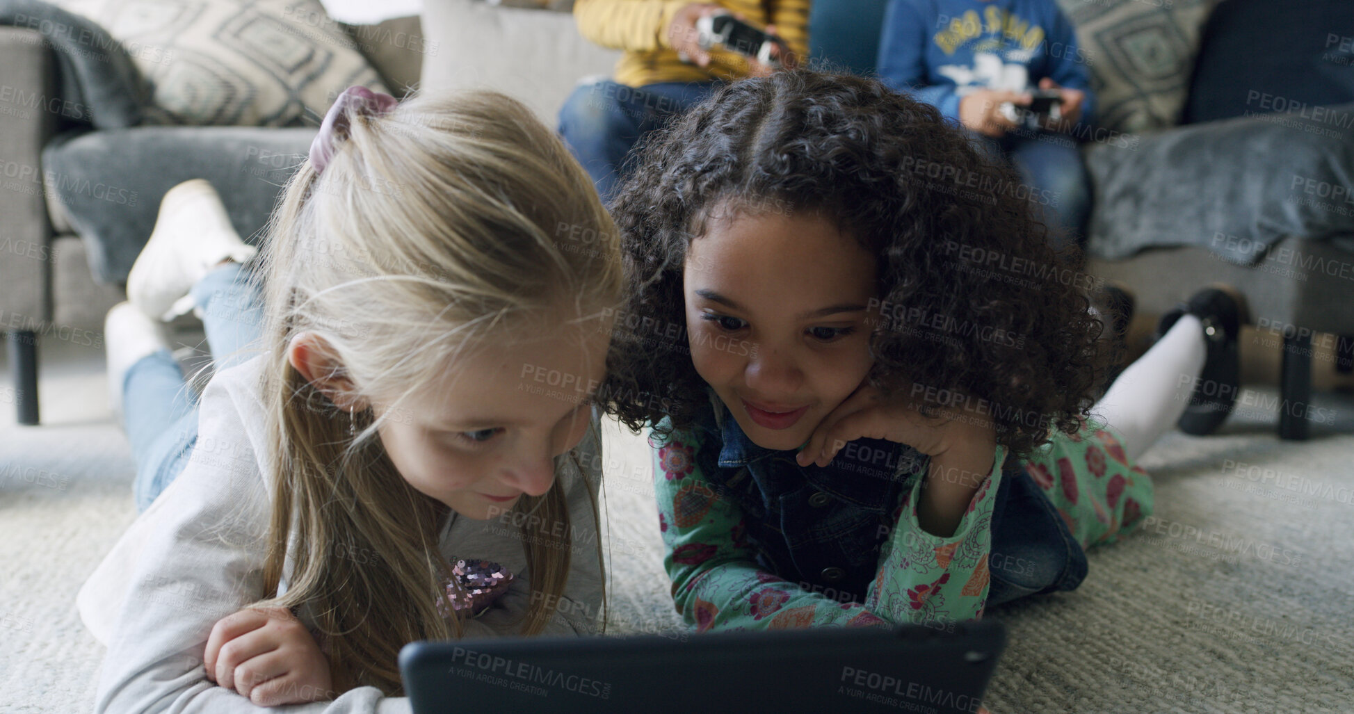 Buy stock photo Relax, friends and kids with tablet in home for movie, internet app or streaming cartoon. Girls, living room and children with technology to watch show together, entertainment and smile on floor