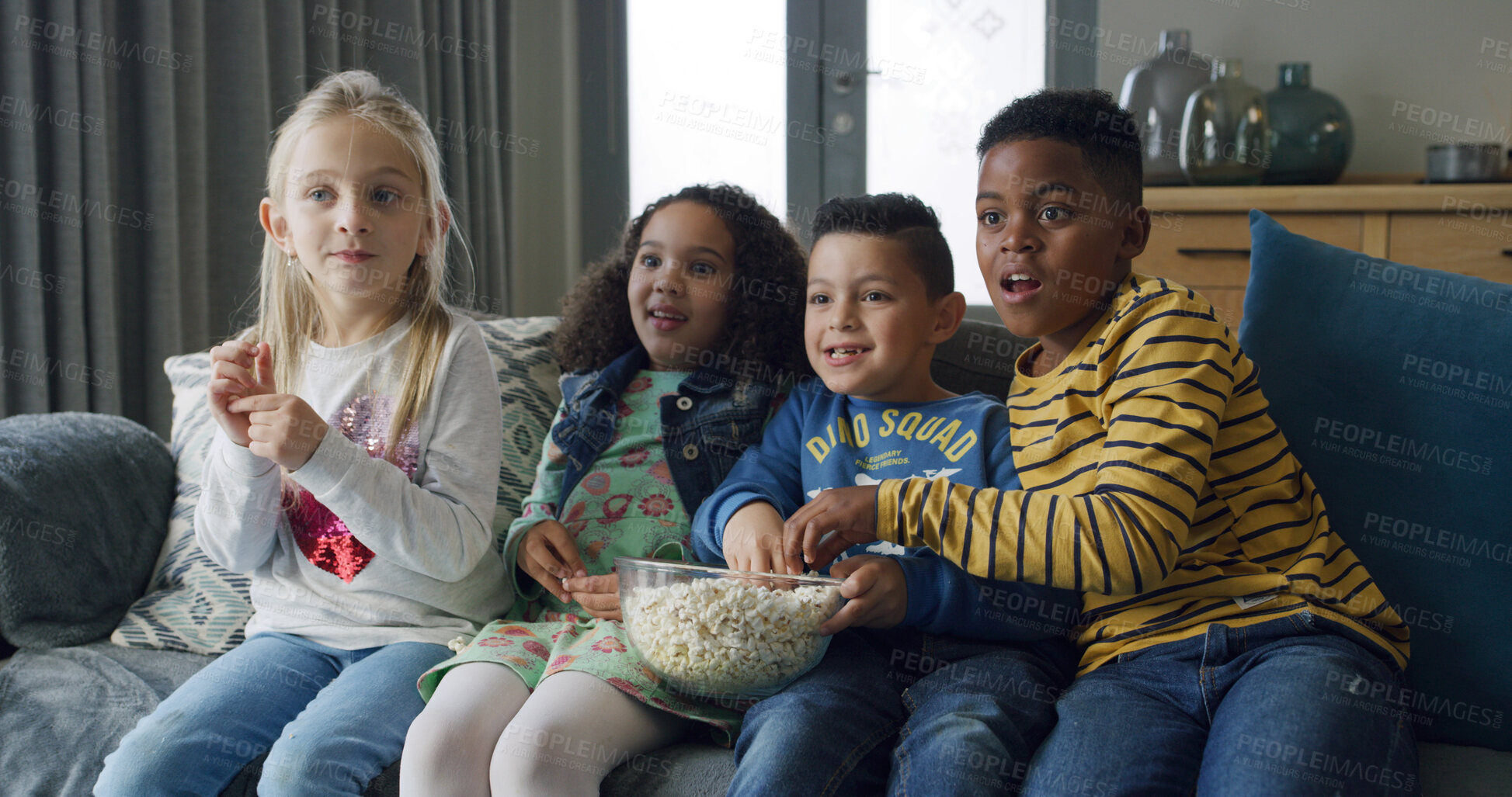 Buy stock photo Happy children, friends and watching TV with popcorn on sofa for movie or online entertainment. People, kids or eating snack with shock or anticipation for streaming subscription or suspense in home
