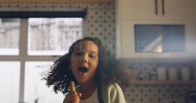 Buy stock photo Singing, broom and portrait of child in kitchen for fun, music and happy while cleaning. Home, childhood and girl with energy, karaoke and song for housekeeping, chore routine and hygiene on weekend