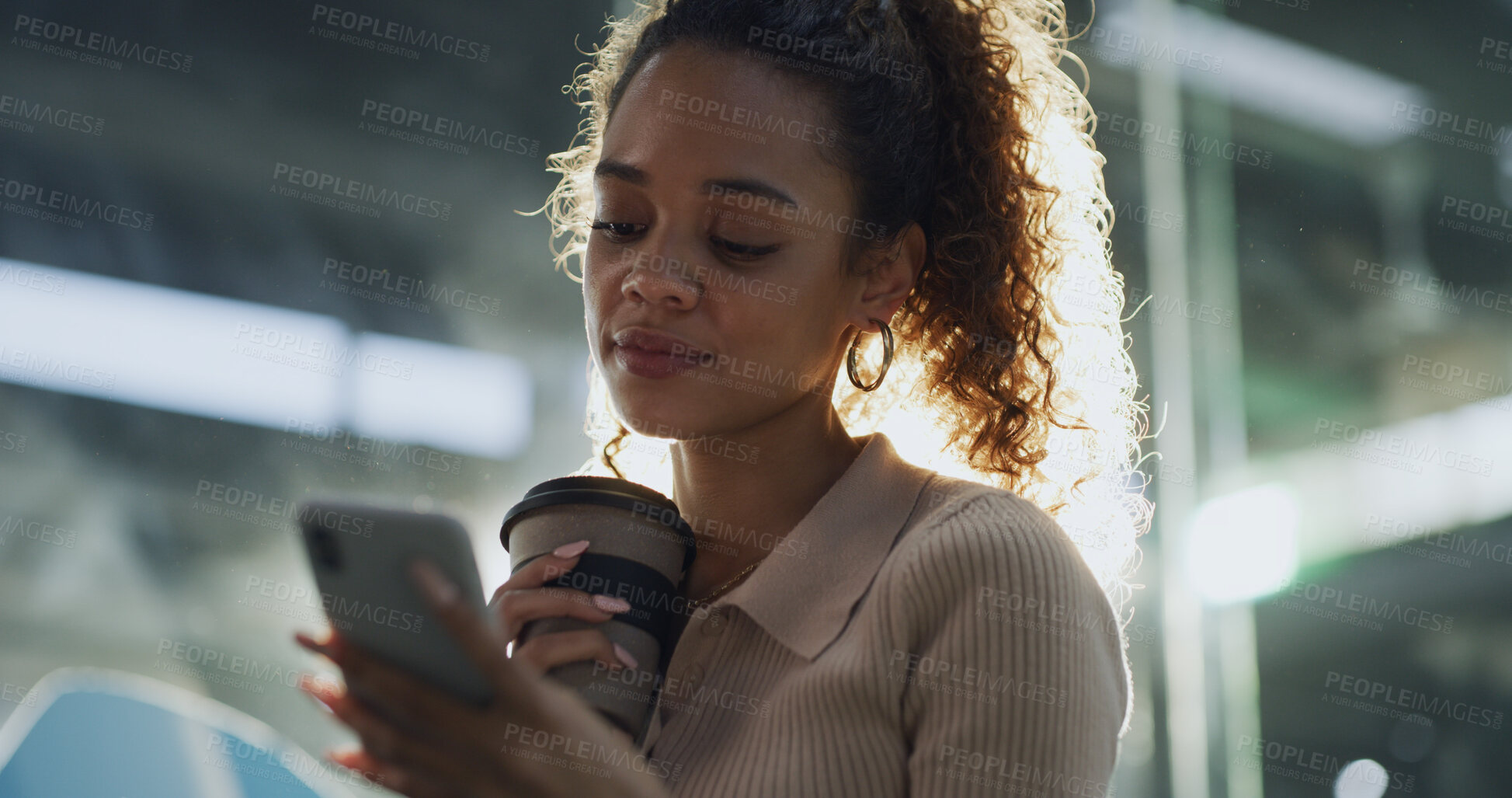 Buy stock photo Coffee, phone and travel with woman in bus terminal for commute schedule or public transportation. App, drink and check in with passenger in lobby or waiting room at night for communication or trip