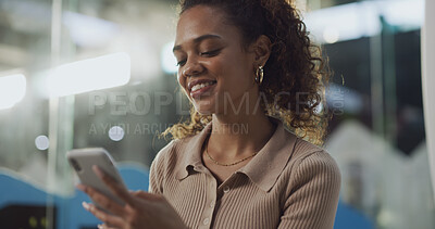 Buy stock photo Phone, smile and text message with woman in terminal of airport for agenda or flight schedule. App, check in and online booking with happy passenger in waiting room at night for communication or trip