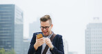Celebrate, phone and businessman in city with message for winning, success or achievement. Technology, happy and excited male person with smile, morning commute and cellphone on town street for goal