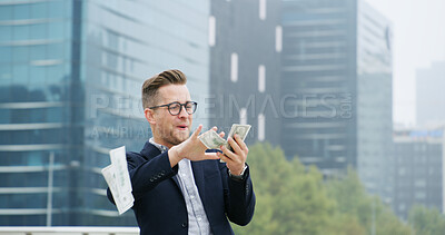 Buy stock photo Happy, businessman and throw money in city for financial freedom, winning and investment celebration. Excited, male person and raining cash for profit, finance success and income achievement in town