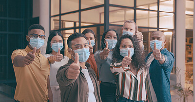 Buy stock photo Thumbs up, portrait and business people with face mask in office for social distance, meeting and safety. Staff, ppe and group of employees with approval hand gesture for health protocol or policy.