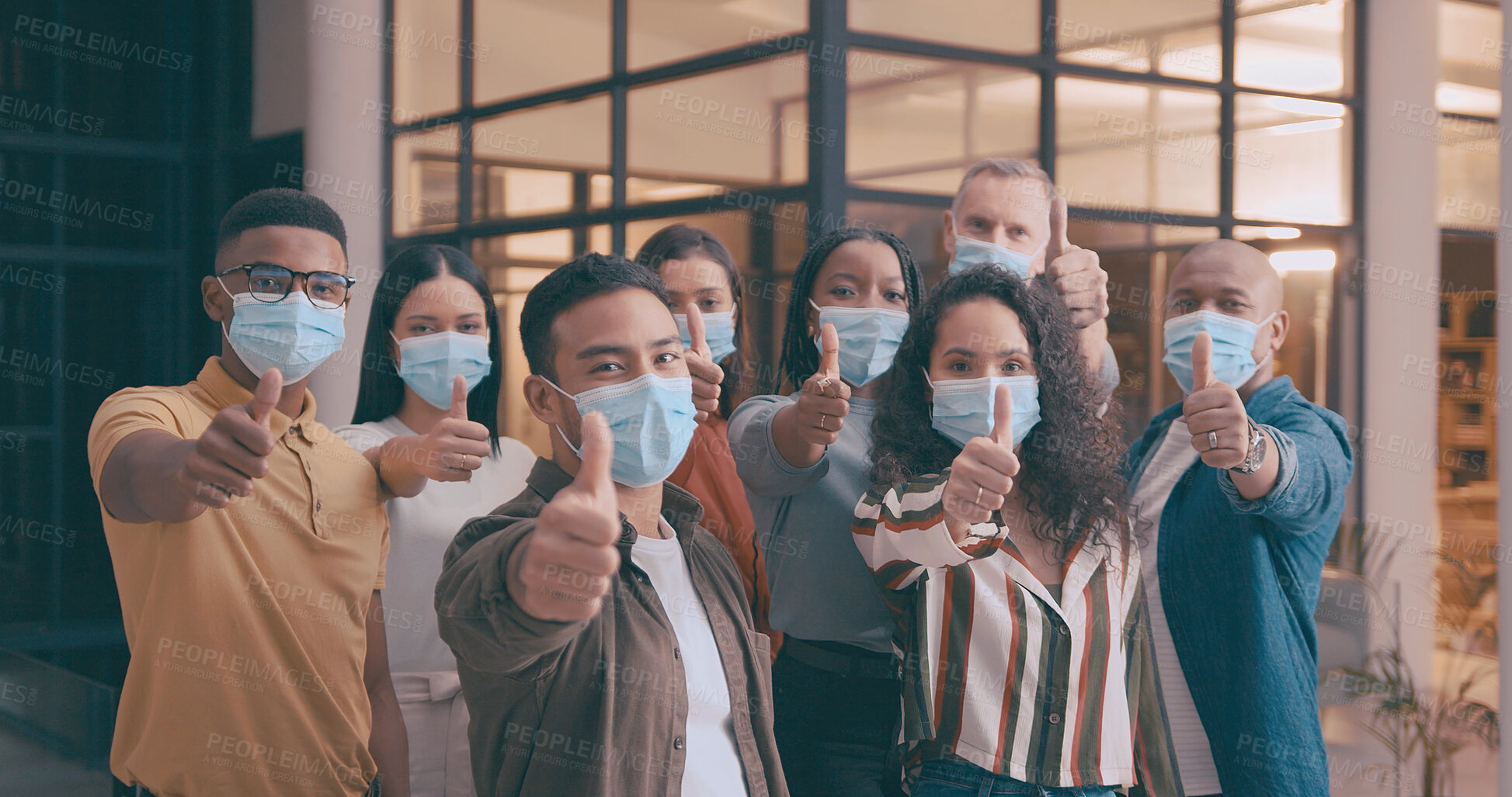 Buy stock photo Thumbs up, portrait and business people with face mask in office for social distance, meeting and safety. Staff, ppe and group of employees with approval hand gesture for health protocol or policy.