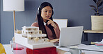 Laptop, woman and architect with thinking, blueprint and research of engineer in office. Paperwork, headphones and planning with architecture model for construction project with design prototype