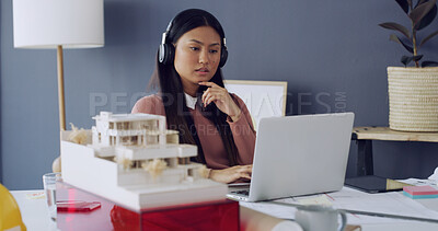 Buy stock photo Laptop, woman and architect with thinking, blueprint and research of engineer in office. Paperwork, headphones and Asian person with architecture model for construction project with design prototype