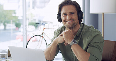 Buy stock photo Headphones, laptop and portrait of man in green office for streaming sound as small business employee. Computer, music and smile of designer person in eco friendly workplace for project management