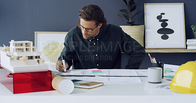 Buy stock photo Man, architect and writing on blueprint in office for sketch, building ideas and design process. Male person, 3d model and floor plan information, project planning and notes for property development