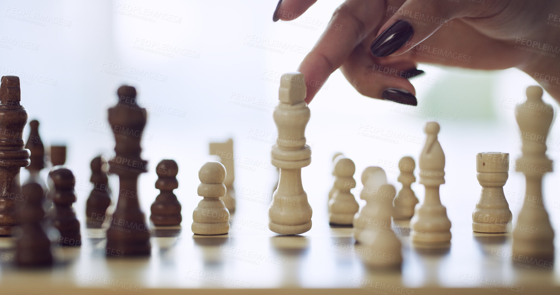 Buy stock photo Chess, strategy and contest with hand of woman in home for relax, problem solving and challenge. Checkmate, tournament and versus with person and king piece on chessboard for hobby and competition