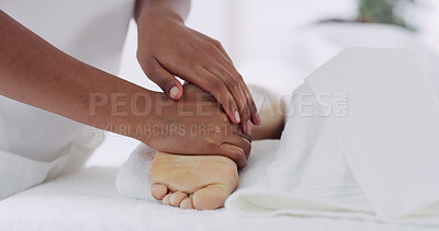 Buy stock photo Hands, beauty therapist and foot massage at spa to relax muscles, pain relief or pamper treatment. Luxury, people and masseuse at resort with wellness therapy, stress reduction and blood circulation