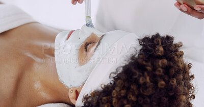 Buy stock photo Face, brush and woman with clay mask at spa, beautician and client with self care, skincare and wellness. Facial, treatment and beauty with antiaging, moisturizing and skin detox at health resort