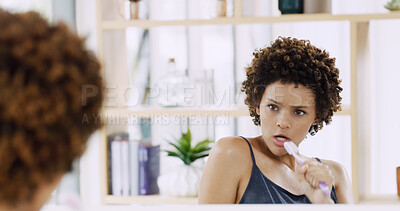 Buy stock photo Mic, singing and toothbrush with woman in bathroom mirror of home for energy, fun or hygiene. Attitude, brushing teeth and cleaning with serious African person in apartment for dental or oral care