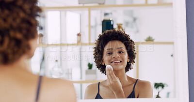 Buy stock photo Woman, mirror and cotton pad for beauty in home, cleaning or hygiene with makeup removal or skin toner. Self care, routine and African person at house with reflection for dermatology and skincare