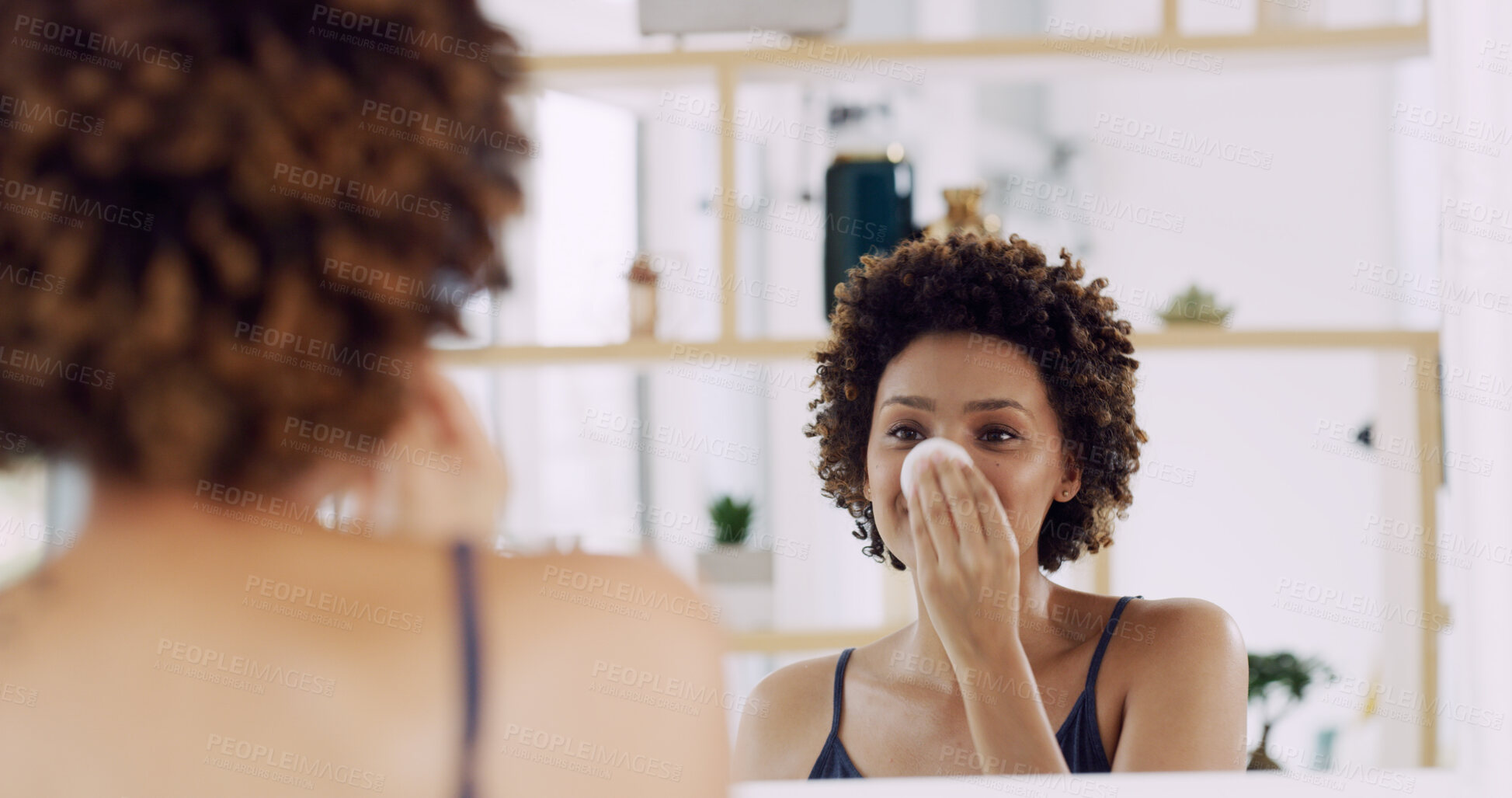Buy stock photo Girl, mirror and cotton pad for skincare in house, cleaning or hygiene with makeup removal or skin toner. Self care, routine and African person at home with reflection for dermatology and beauty
