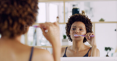 Buy stock photo Woman, mirror and toothbrush for dental in home, teeth and gum cleaning for hygiene, wellness and health. African person, oral care and brush for whitening, morning routine and reflection in house
