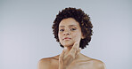 Portrait, black woman and skincare for cosmetics, aesthetic and skin hydration on studio background. African model, person and glow with smile, mockup and dermatology treatment for natural beauty