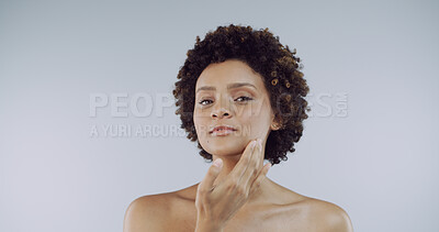 Buy stock photo Portrait, woman and skincare for cosmetics, aesthetic and skin hydration on studio background. African model, person and glow with confidence, mockup and dermatology treatment for natural beauty