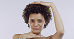 Woman, hand frame and skincare in studio portrait with afro, confident or pride on white background. Girl, smile and results with dermatology, cosmetics and beauty with natural makeup in Costa Rica