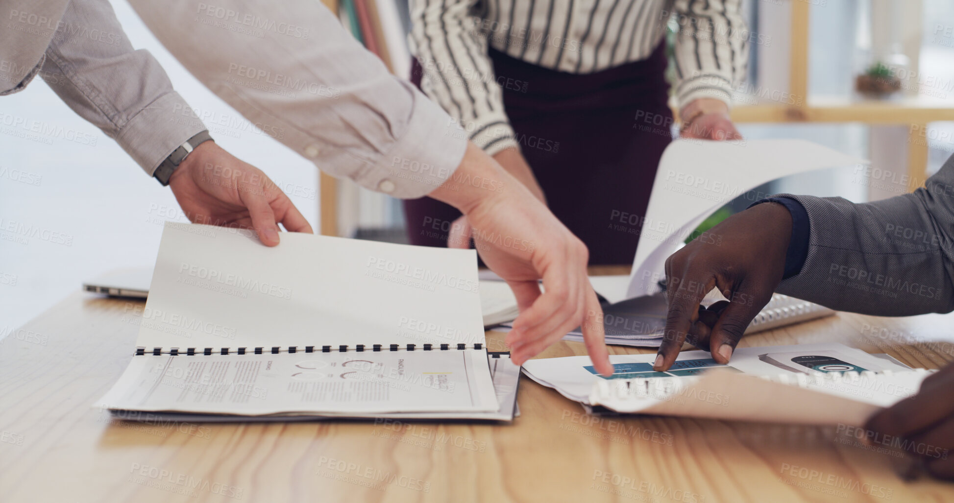 Buy stock photo Office, meeting and hands of business people with documents for planning finance review or strategy. Corporate, pointing and team of workers with paperwork, research and financial report for proposal
