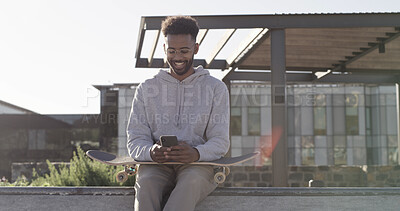 Buy stock photo Skater, man or happy with phone in city for text message, check skating schedule or sports research. Skateboard, person and smartphone outdoor for internet browsing, social media and practice break