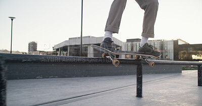 Buy stock photo Skateboard, legs and balance on rail at park for grind trick, training performance and challenge. Skater, person and talent in city with skating workout, hobby and practice action stunt at skatepark