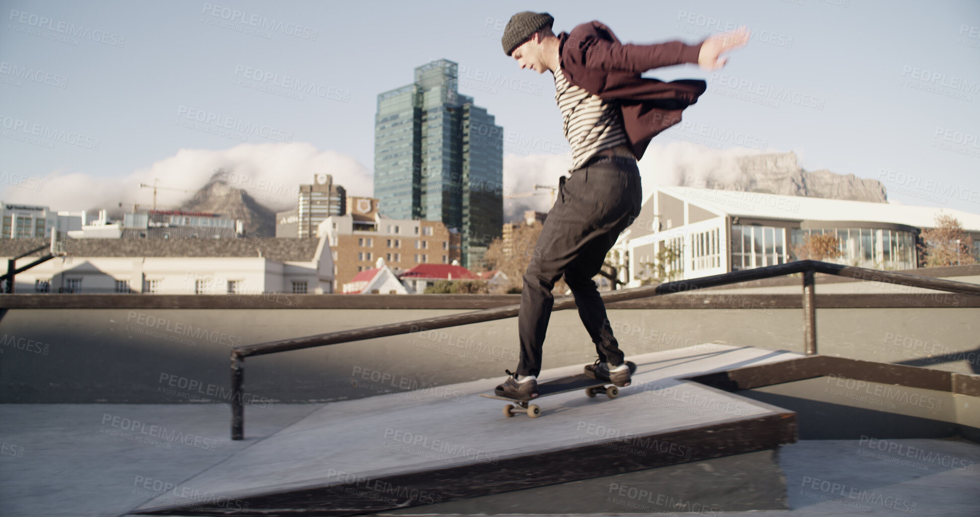 Buy stock photo Skateboard, man or skating with balance at skatepark for action stunt, performance or adrenaline. Skater, person or extreme sport on ledge for adventure, hobby or practice freestyle technique in city