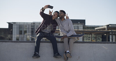 Buy stock photo Men, skateboard and selfie in city, smile and peace sign with embrace, fitness and live streaming. Content creation, influencer and friends with happiness, outdoor and urban town with skater and app