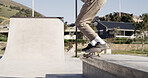 Skateboard, trick or legs with balance in city for grind stunt, performance challenge and talent. Skater, person and extreme sport on ledge for adventure, hobby and practice action technique at ramp