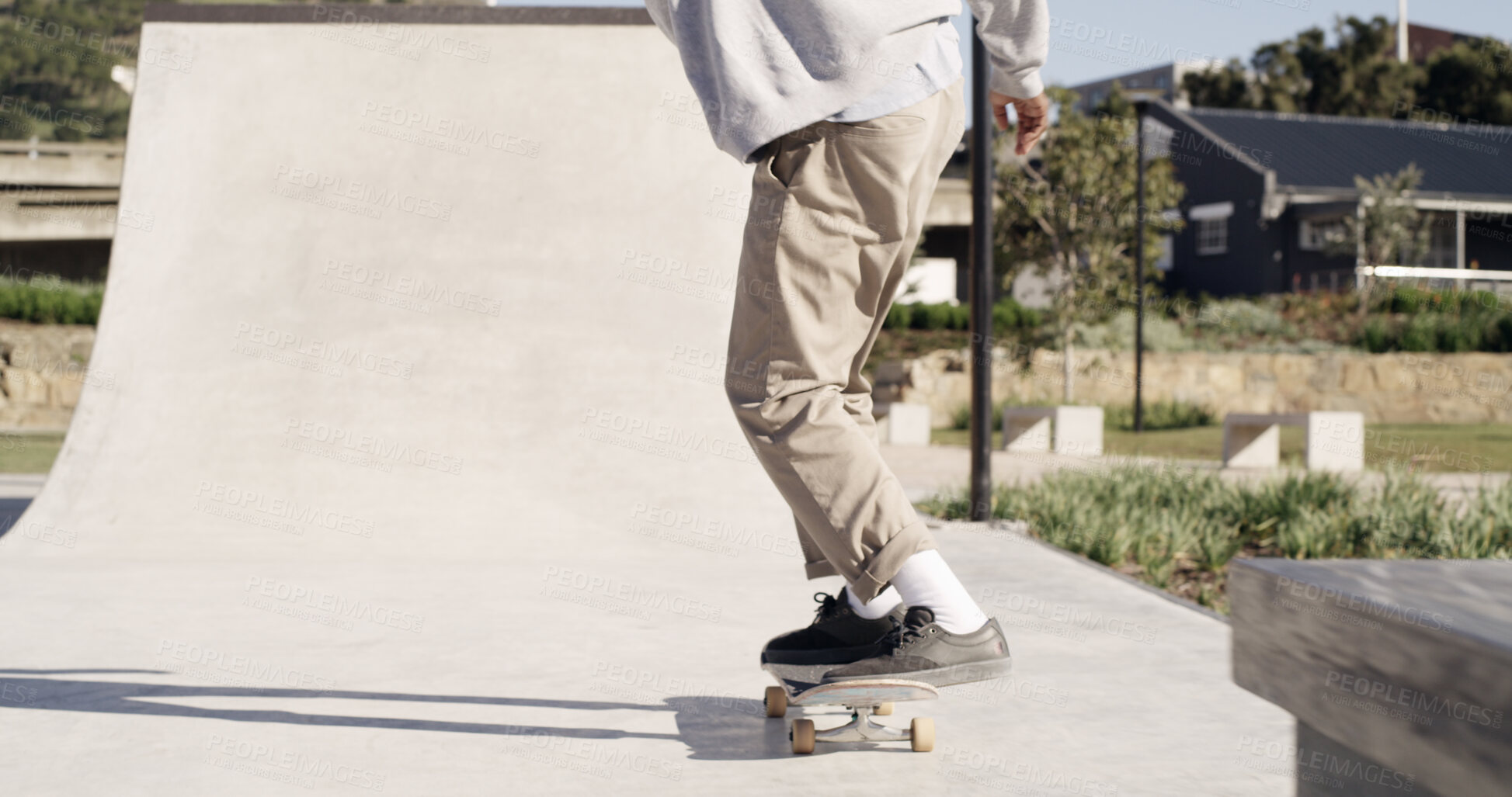 Buy stock photo Skateboard, ramp and legs with skating at skatepark for stunt, performance challenge and training. Skater, person and extreme sport in city for adventure, hobby and practice technique with balance