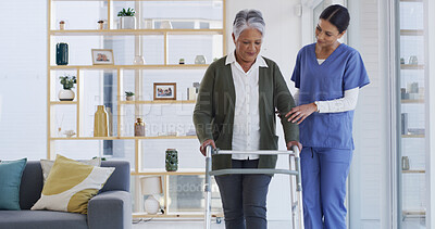 Buy stock photo Women, nurse and elderly patient with walker for recovery, physiotherapy or rehabilitation in home. Female people, caregiver and helping senior person with a disability for assisted living in house