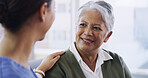Support, nurse and smile with old woman on sofa for empathy, occupational therapist and medical. Healthcare advice, discussion and senior patient with caregiver in nursing home for consulting