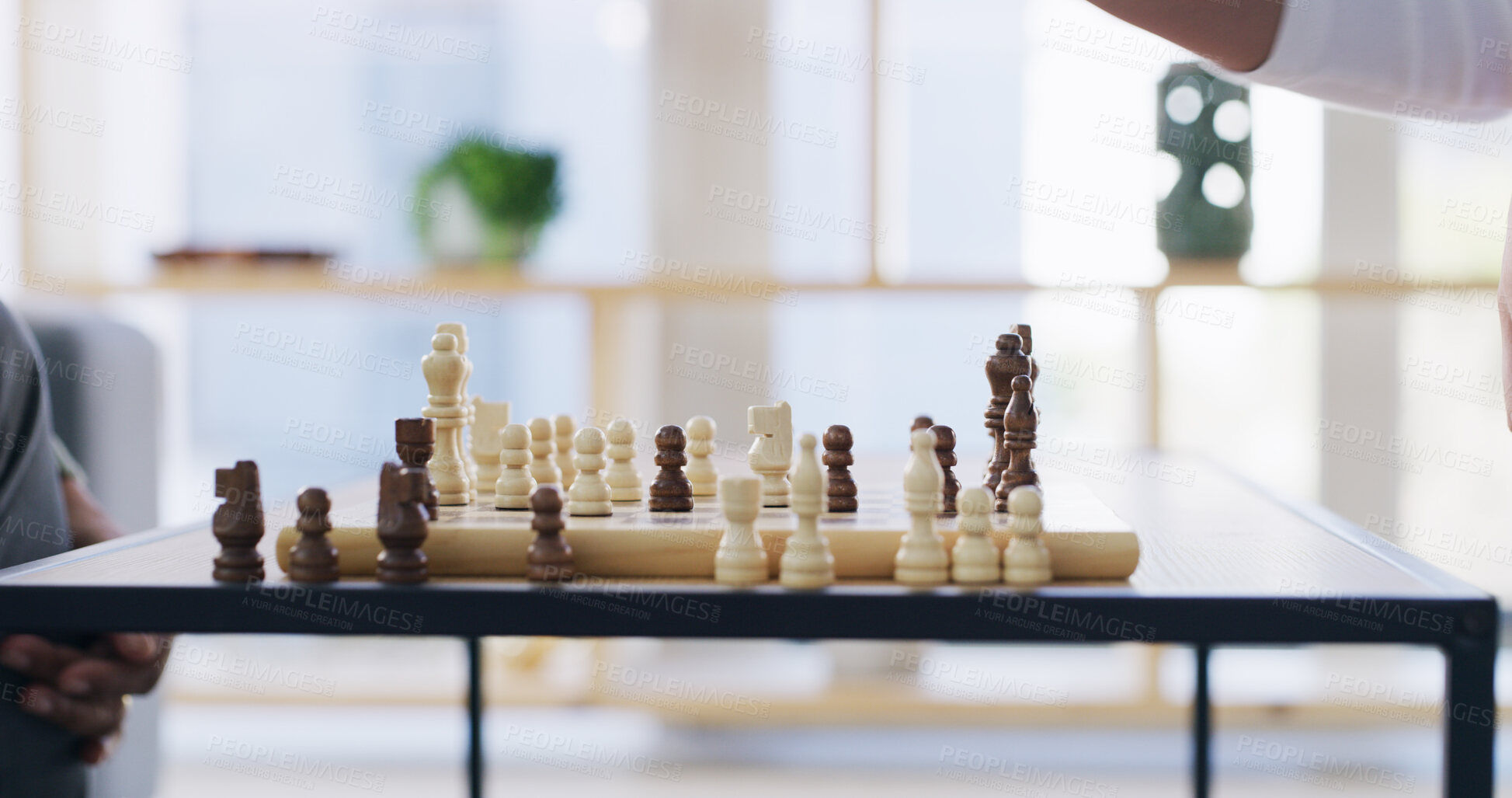 Buy stock photo Chess, hands and game in home with strategy, problem solving and competition. People, contest and play with chessboard on table for challenge, hobby and versus with match together in living room