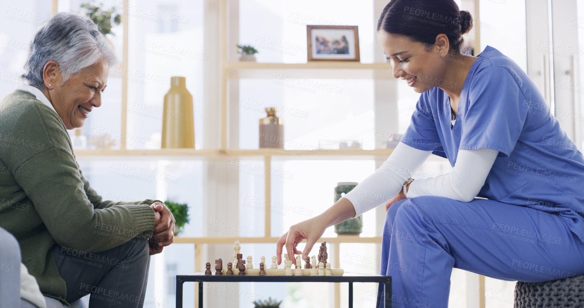 Buy stock photo Nurse, old woman and play chess in home, smile and solution with cognitive function in lounge. Senior person, caregiver and challenge with board game, relax and contest for brain health in retirement