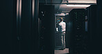 Technician, back and inspection with man in server room for cybersecurity, network and system database. Software update, signal transmission and cloud computing with person in data center for upgrade
