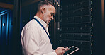 Programmer, technician and tablet with man in server room for hosting database, inspection and cybersecurity. Hardware storage, cloud computing and system backup with mature person in data center