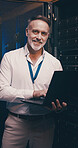 Laptop, portrait and database with man in server room for data center, network or systems. Cybersecurity, software technician and cloud computing with mature person for hardware maintenance and code