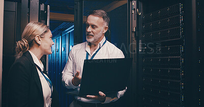 Buy stock photo Laptop, collaboration and team of engineers in server room for technical support, database or cybersecurity. Computer, discussion and people with system upgrade in data center for network programming