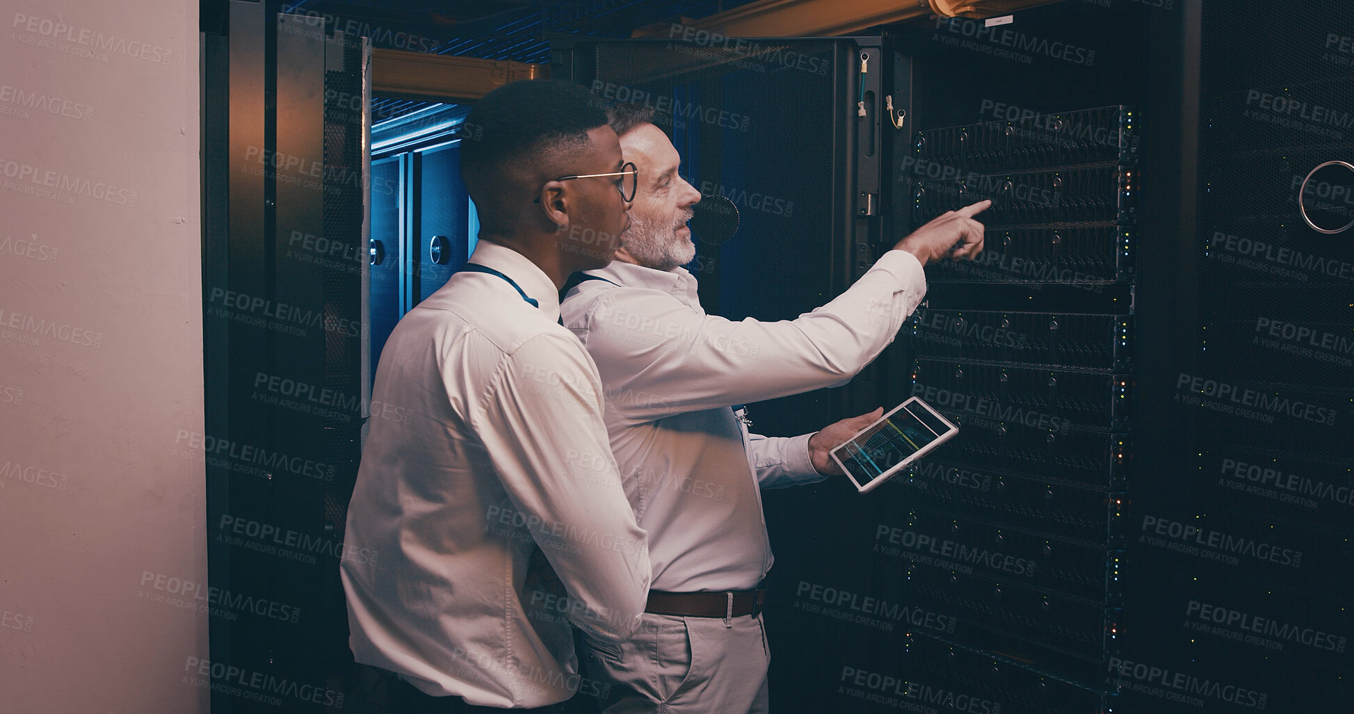 Buy stock photo Men, tablet and team in server room with inspection, point and talk with mentor for system upgrade. People, tech and assessment with app, software update or programming for cybersecurity solution