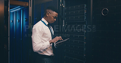 Buy stock photo Technician, black man or typing on tablet in server room for system maintenance, update or GDPR. Data center space, person or tech for troubleshooting software, problem solving or network performance