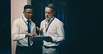 Talking, hardware and men in server room on tablet for network solution, IT support and cybersecurity. Collaboration, discussion and people on digital tech for database, programming and system update