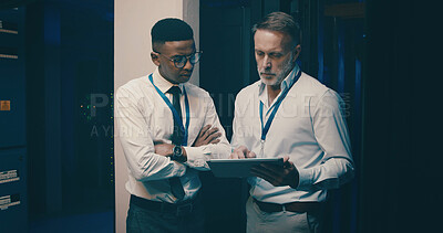 Buy stock photo Hardware, talking and men in server room on tablet for network solution, IT support and cybersecurity. Collaboration, discussion and people on digital tech for database, programming and system update