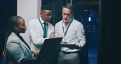 Buy stock photo Talking, it support and people with tech in server room for cybersecurity, diagnostics and network. Team, meeting and workers on laptop, tablet and hardware for system update, database and backup