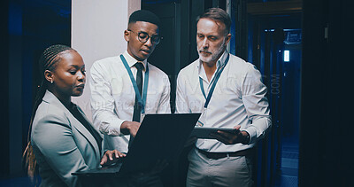 Buy stock photo Man, laptop and team with planning in server room with cybersecurity, system or collaboration. Programmer, tech and group with insight for problem solving, maintenance or IT solution at data center