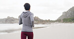 Back of woman, fitness and run on beach for exercise, workout or outdoor wellness. Female person, athlete or runner with marathon, preparation and cardio training with space in nature for health