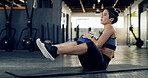 Russian twist, medicine ball and workout with woman in gym for abs fitness, health and exercise. Wellness, bodybuilder and core strength with person on floor of sports club for oblique training