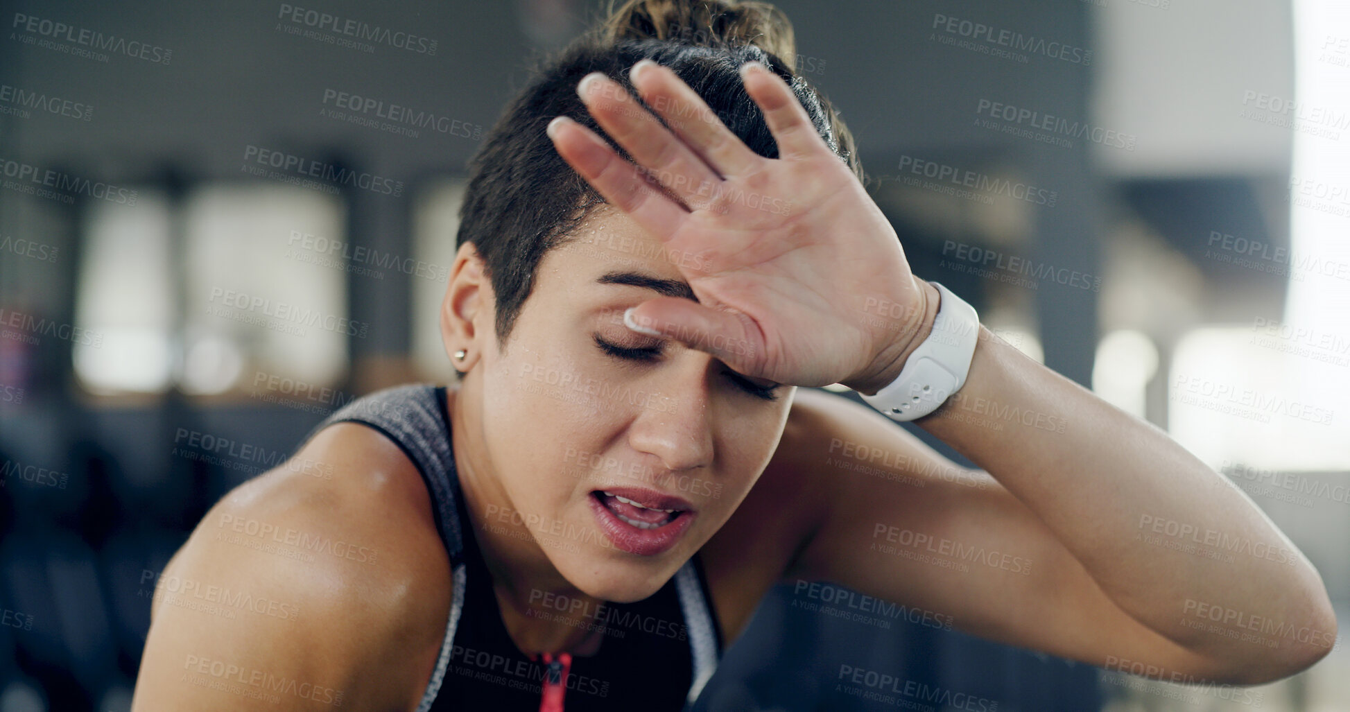 Buy stock photo Tired, sweating and fitness with woman in gym for workout, exercise fatigue and breathing. Training burnout, exhausted and intense cardio with person in sports club for break, resting and resilience
