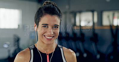 Buy stock photo Earphones, fitness and portrait of woman in gym with satisfaction for training or workout. Exercise, music and smile with happy athlete streaming radio in health club for cardio or challenge