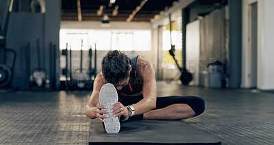 Buy stock photo Stretching, legs and fitness with woman in gym for workout, health and strength training. Muscle warm up, bodybuilder and exercise with female person in sports club for athlete, start and wellness